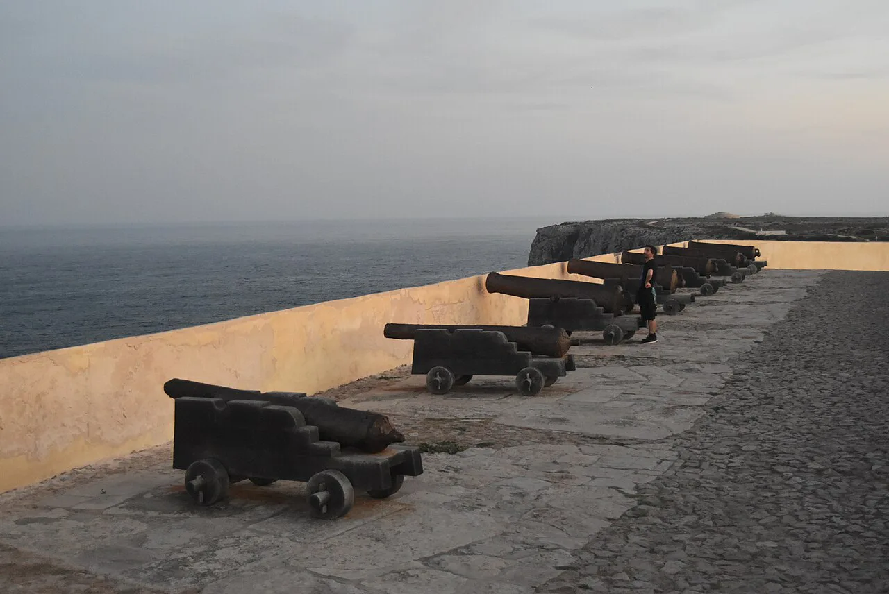 Cannons on the ramparts of the Fortaleza de Sagres at sunset.