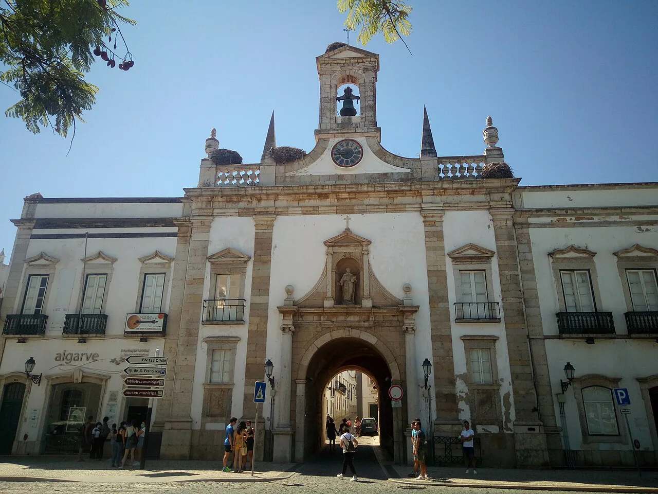 The Arco da Vila, a triumphal arch with Ionic columns, at the entrance to Faro's old town.