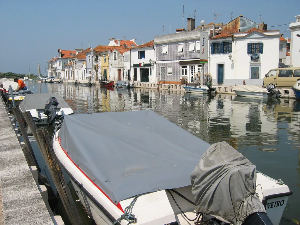 Boats moored on a canal near the fish market in Aveiro.