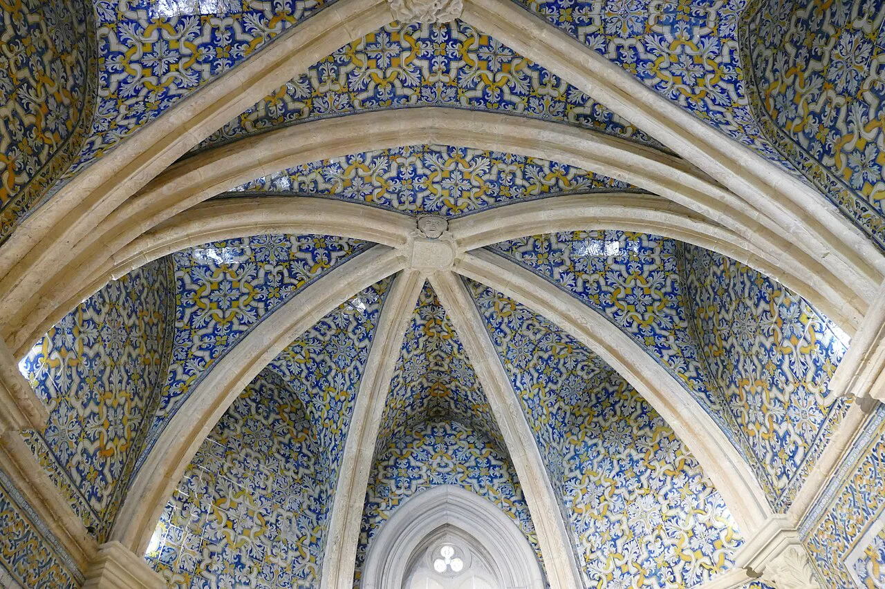 A vaulted ceiling covered in azulejos in the Chapel of Our Lady of Conception, Faro Cathedral.