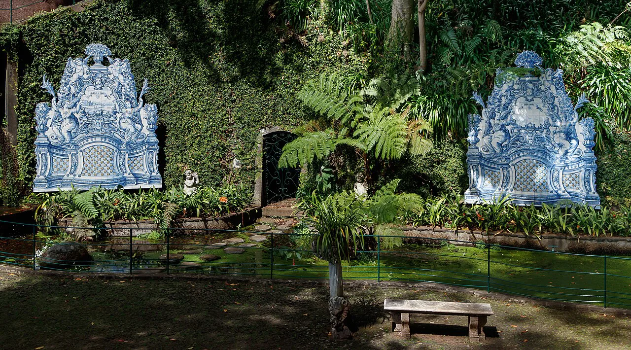 Blue and white azulejo panels set among plants at Monte Palace Tropical Garden in Funchal.