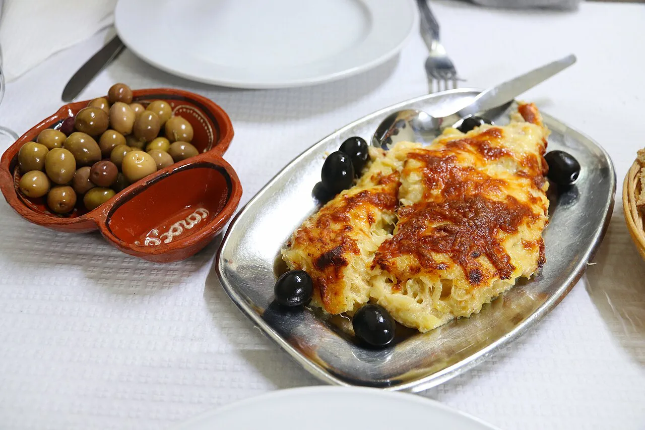Bacalhau com natas served in a restaurant in Coimbra.