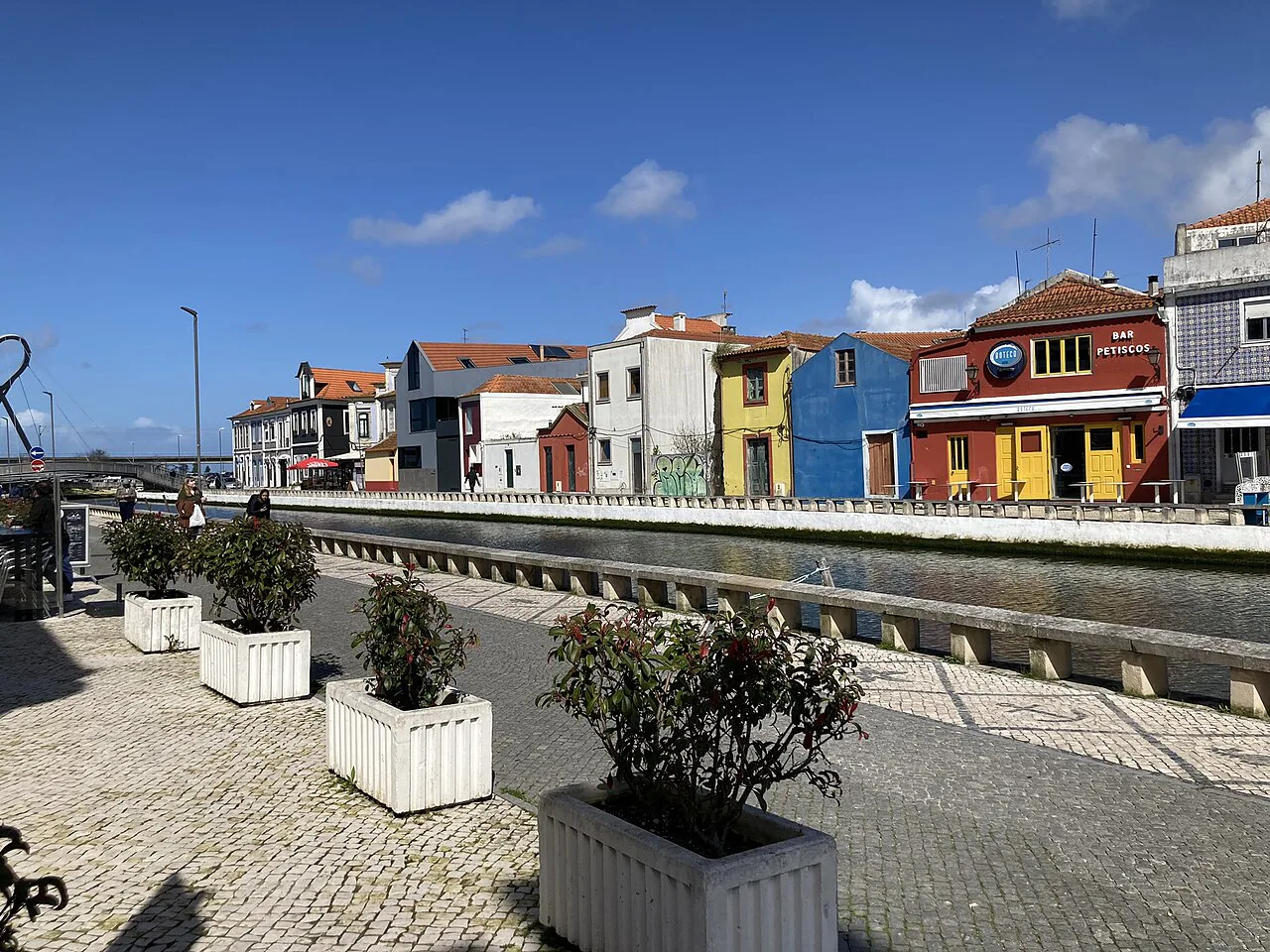 Colourful houses on the Cais dos Botirões by the Canal de São Roque in Aveiro.