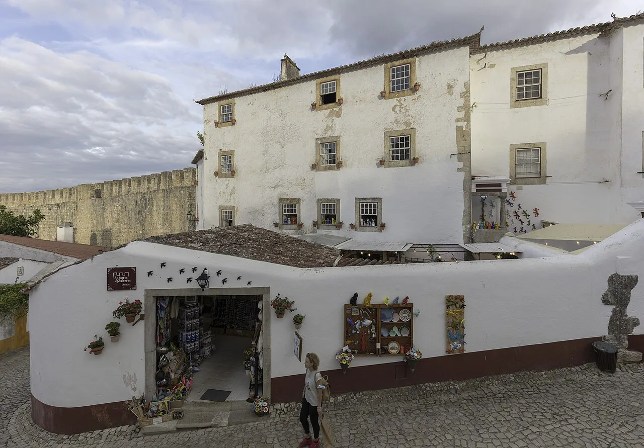 A souvenir shop in a whitewashed building in Óbidos.
