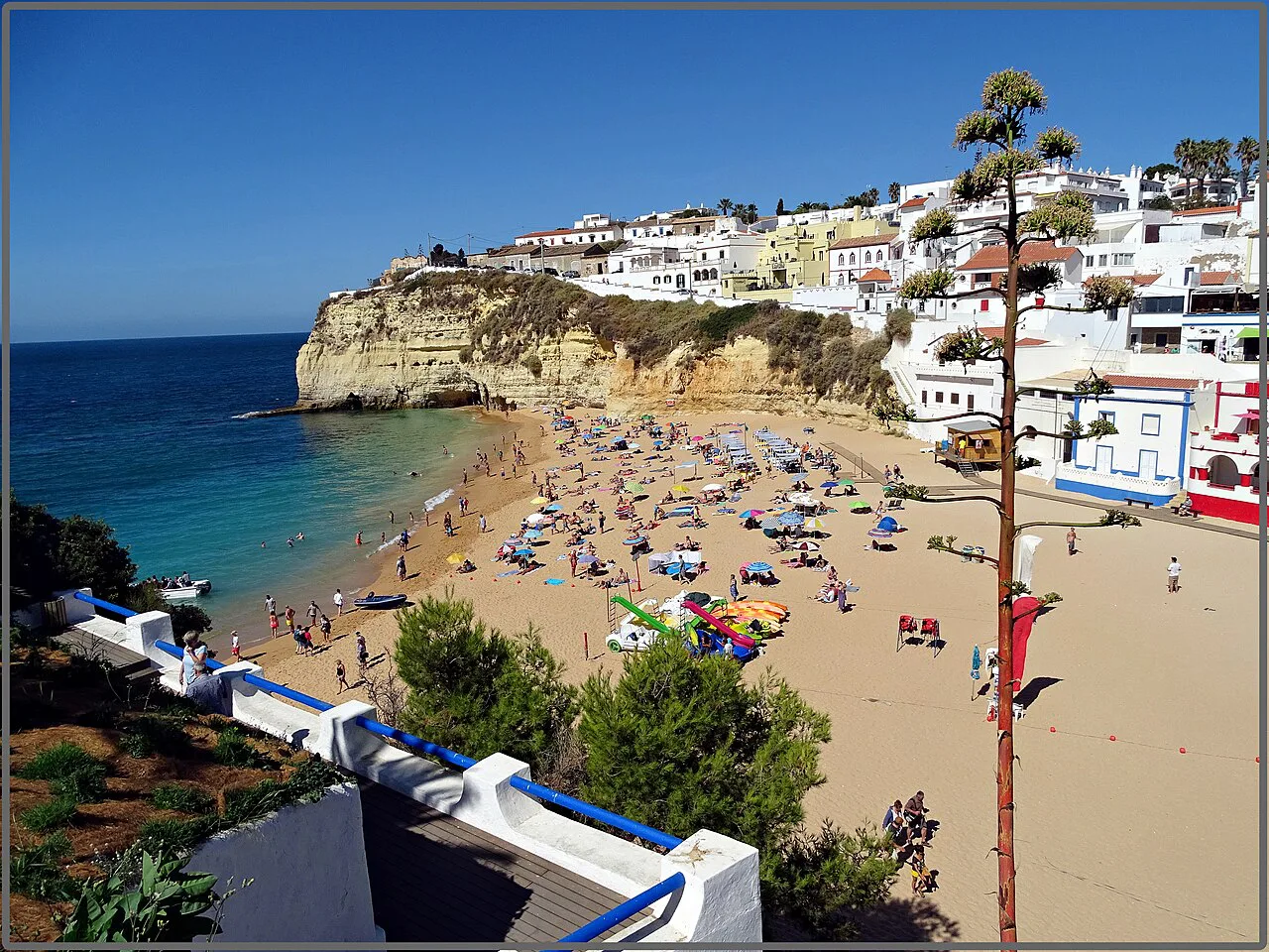 Carvoeiro's beach and the white houses of the town on the cliffs above.