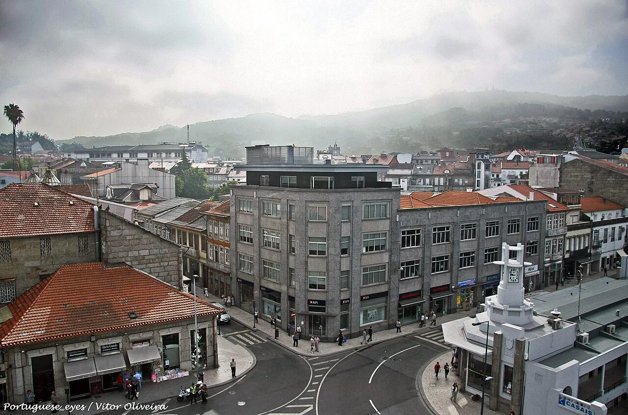 Buildings and streets in central Guimarães seen from above.