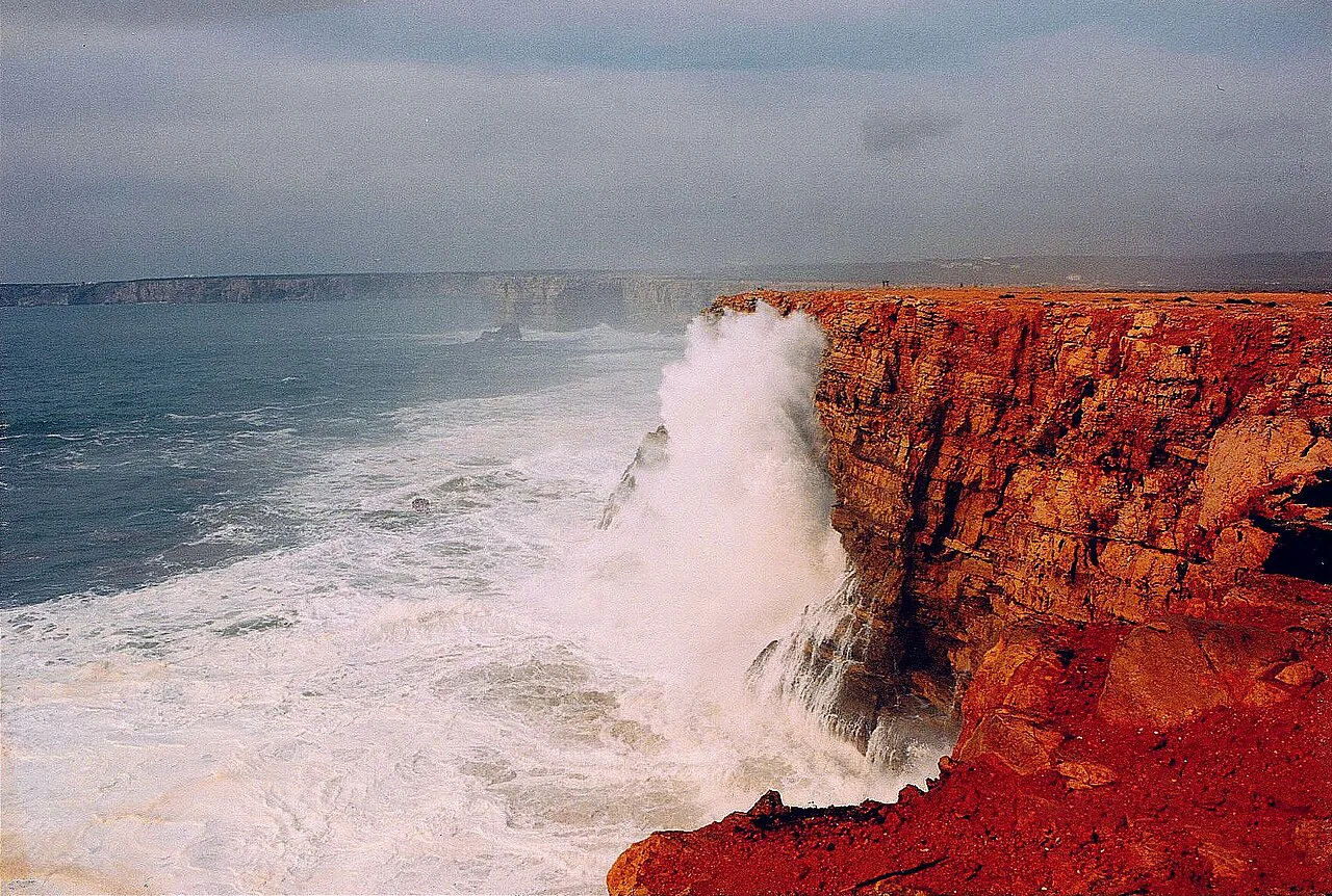 Atlantic storm waves breaking against the cliffs near Sagres in Vila do Bispo.