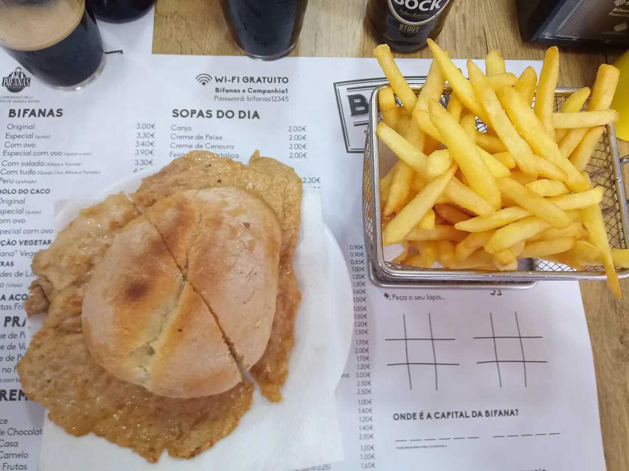A bifana from Vendas Novas served with chips.