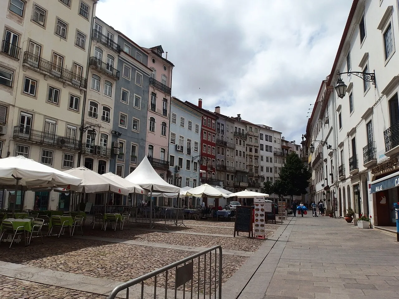 Café terraces on Praça do Comércio in Coimbra.