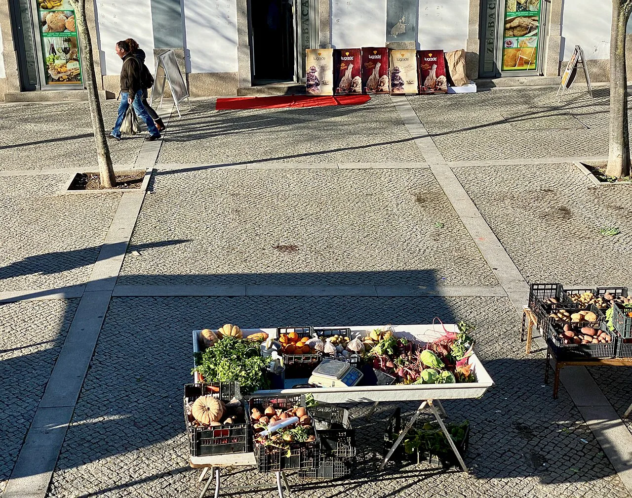 A produce stall outside the Mercado Municipal 1º de Maio in Évora.