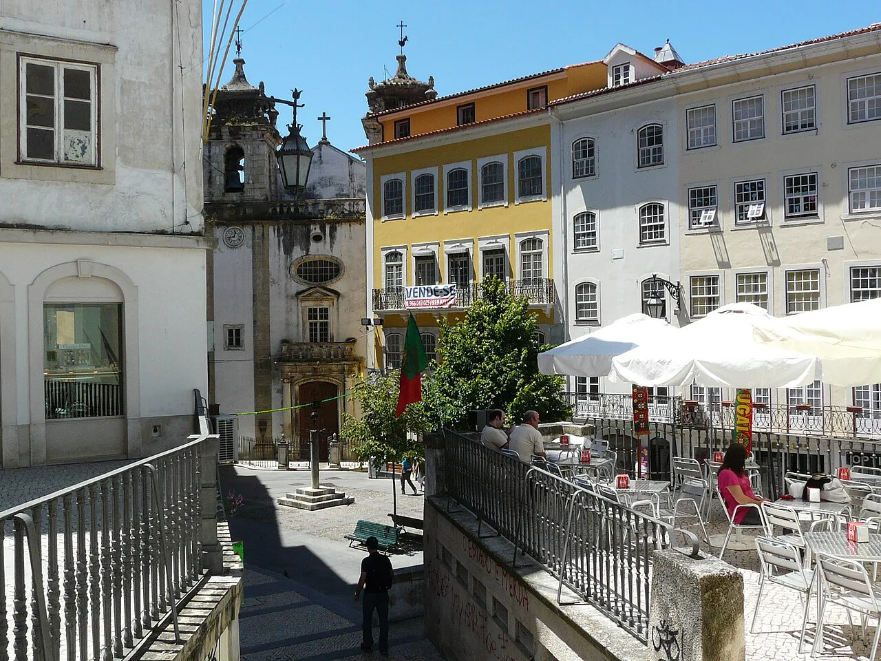 A café terrace on Praça do Comércio in Coimbra.