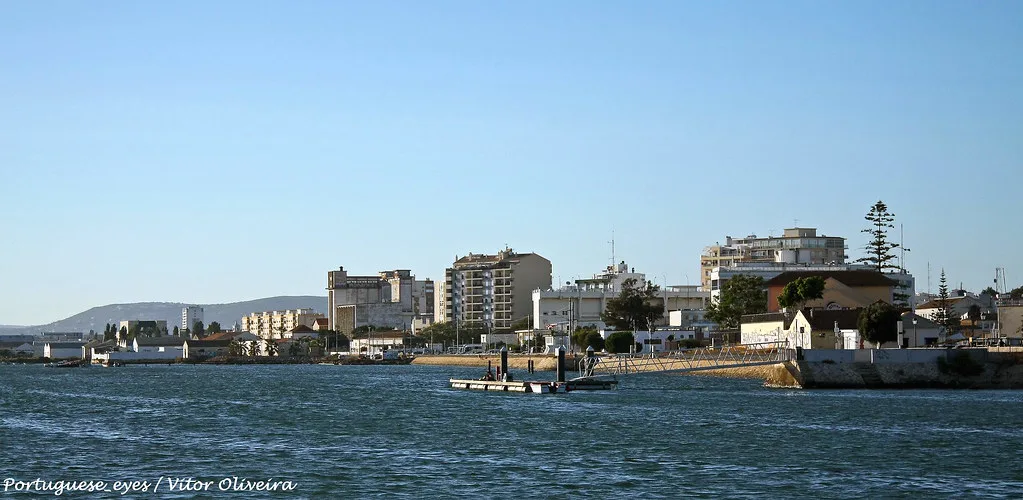 A view of Faro's waterfront across the water.