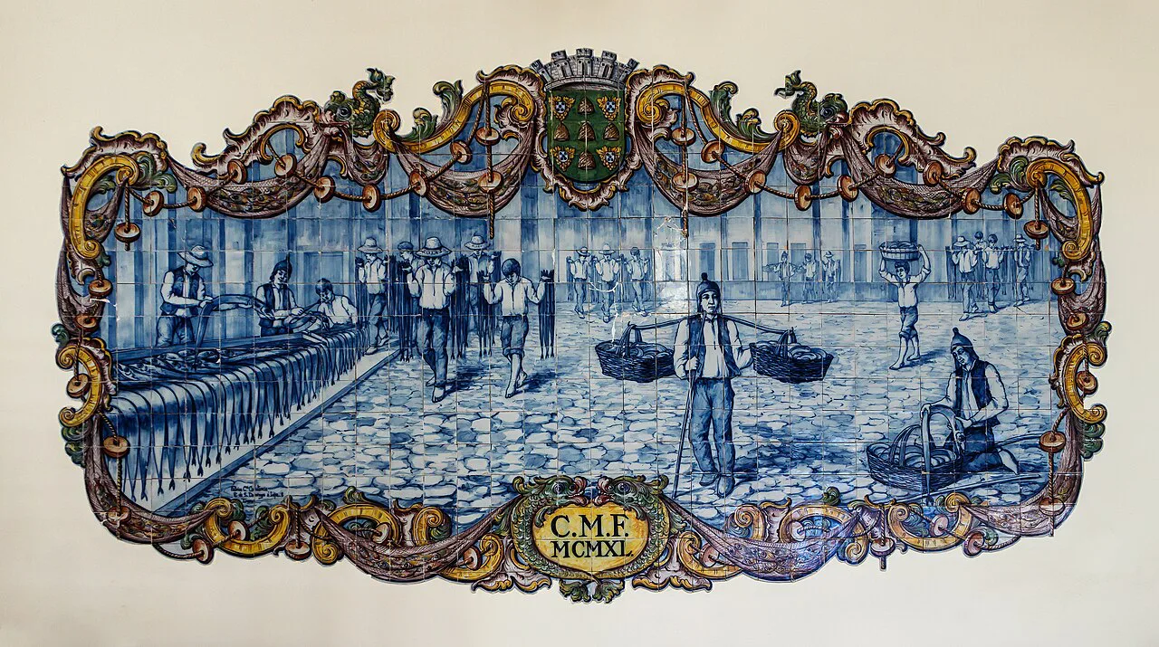 An azulejo panel of fish sellers on the wall of the Mercado dos Lavradores in Funchal.