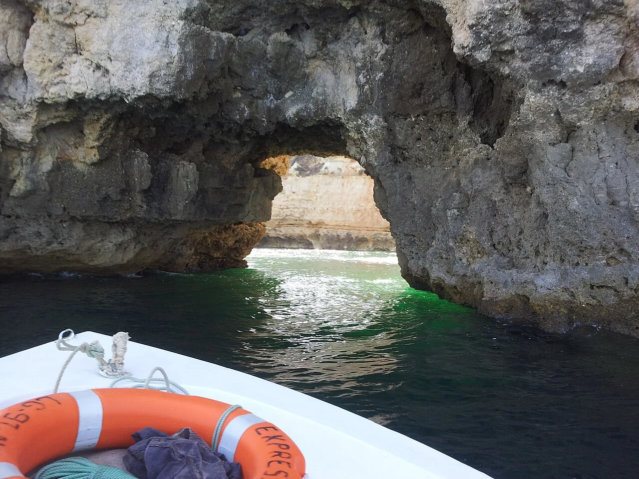 A sea cave at Algar Seco seen from a boat.