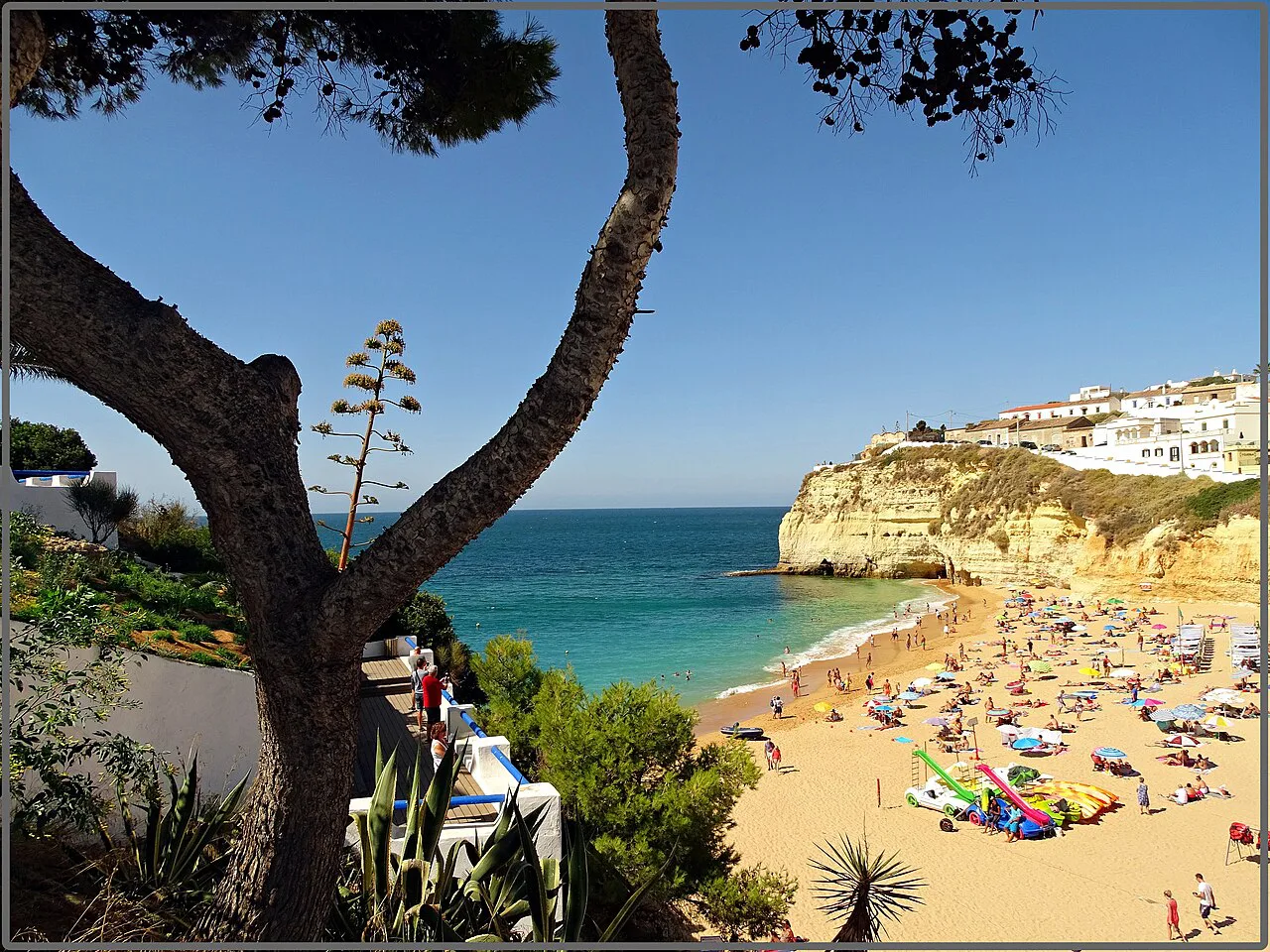 The beach and cliff-top houses of Carvoeiro.