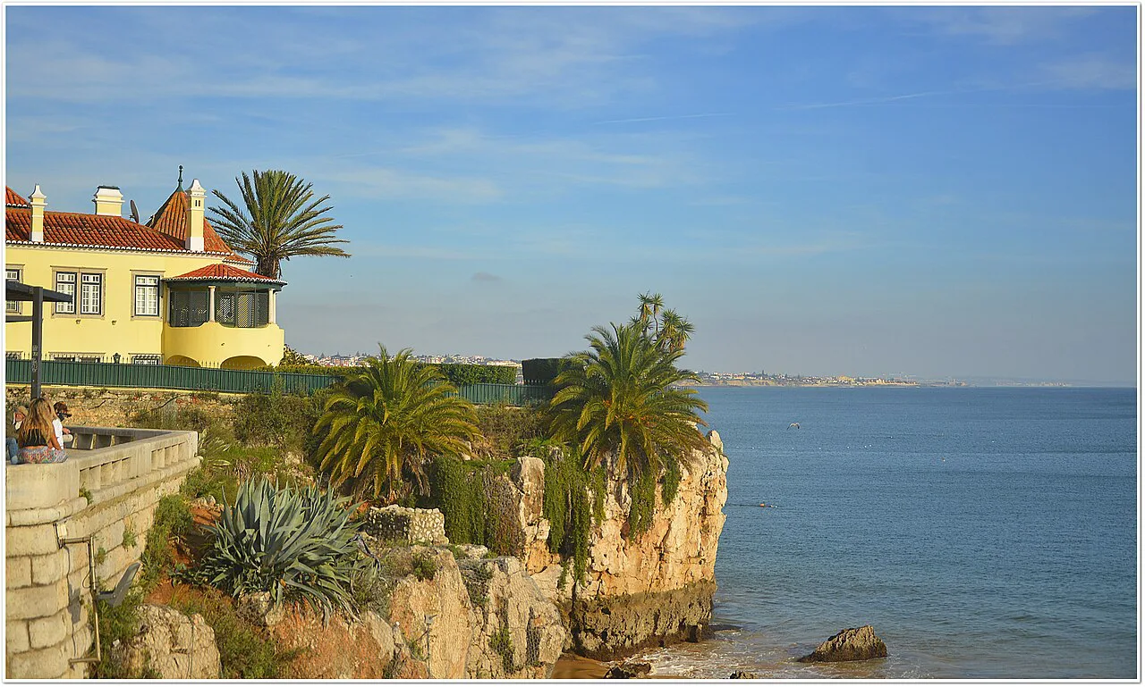 The rocky coastline and seafront houses of Cascais.