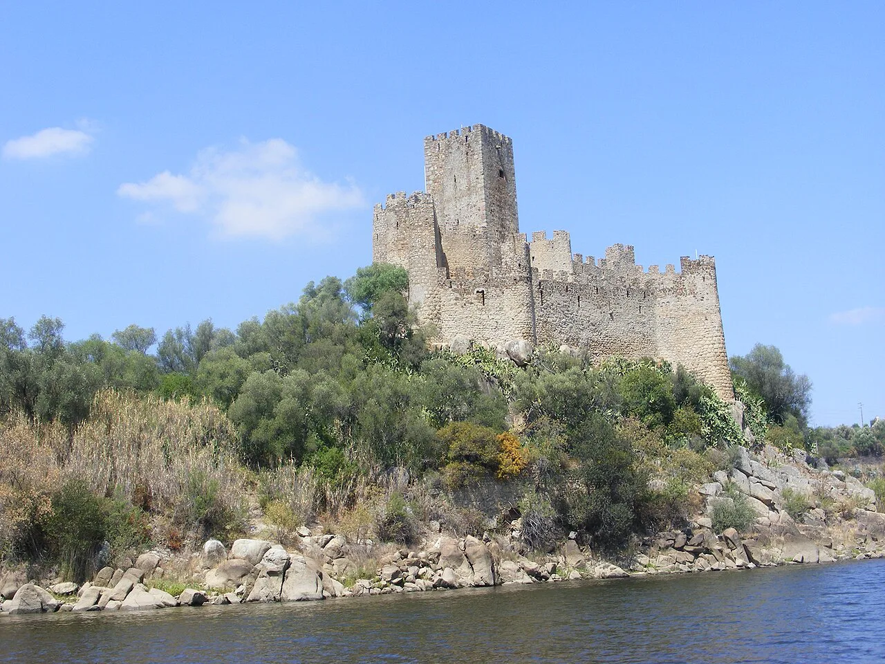 Almourol Castle on its wooded island in the River Tagus.