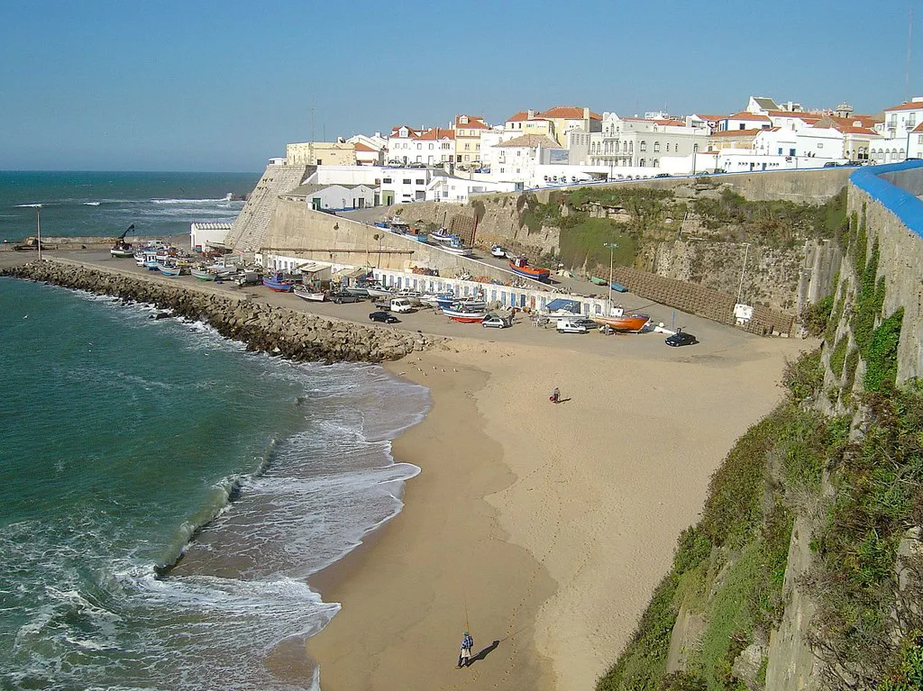 A beach below the whitewashed houses of Ericeira.