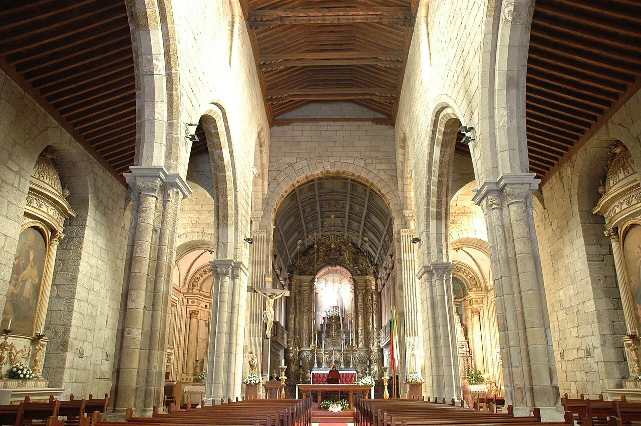The Gothic nave and altar inside the Church of Nossa Senhora da Oliveira in Guimarães.