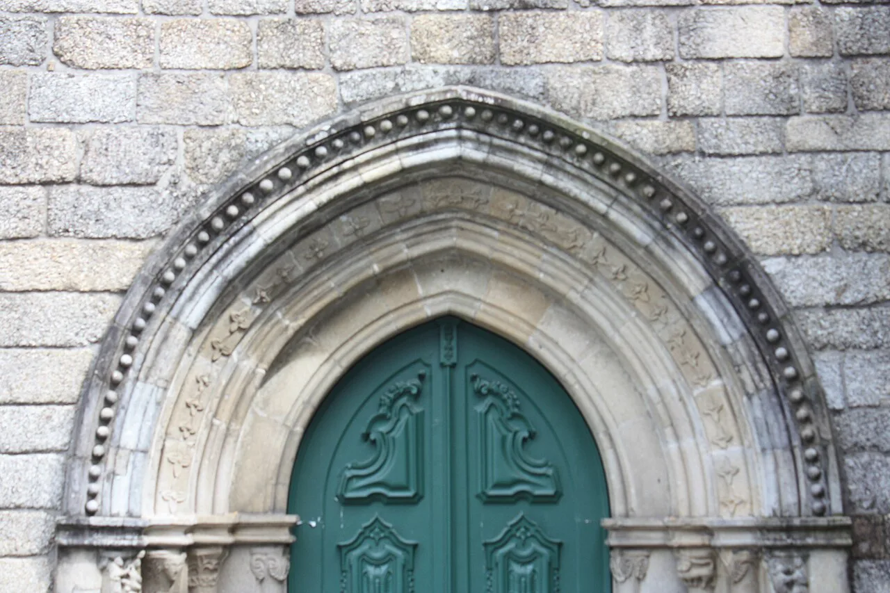 A Gothic carved portal at the Convento de São Francisco in Guimarães.