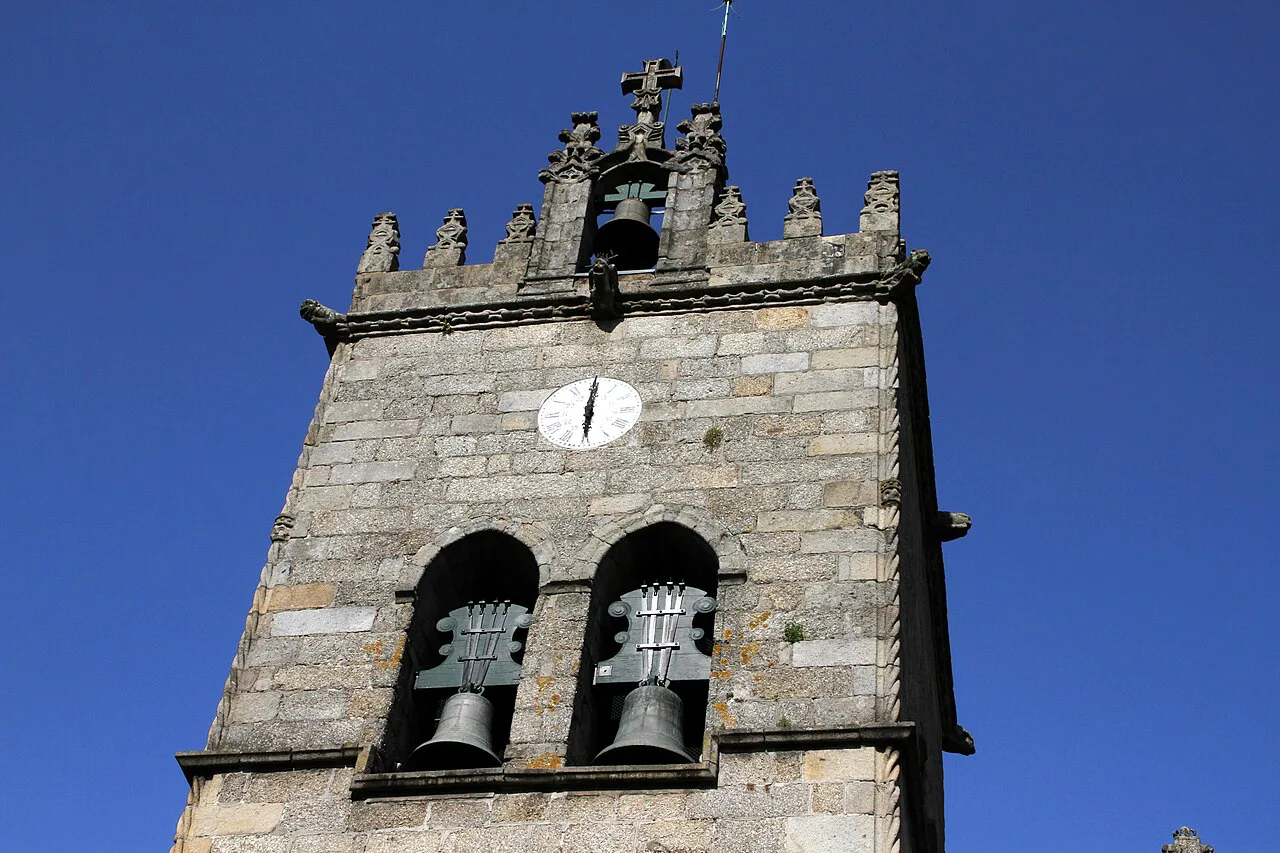 The granite bell tower of the Church of Nossa Senhora da Oliveira in Guimarães.
