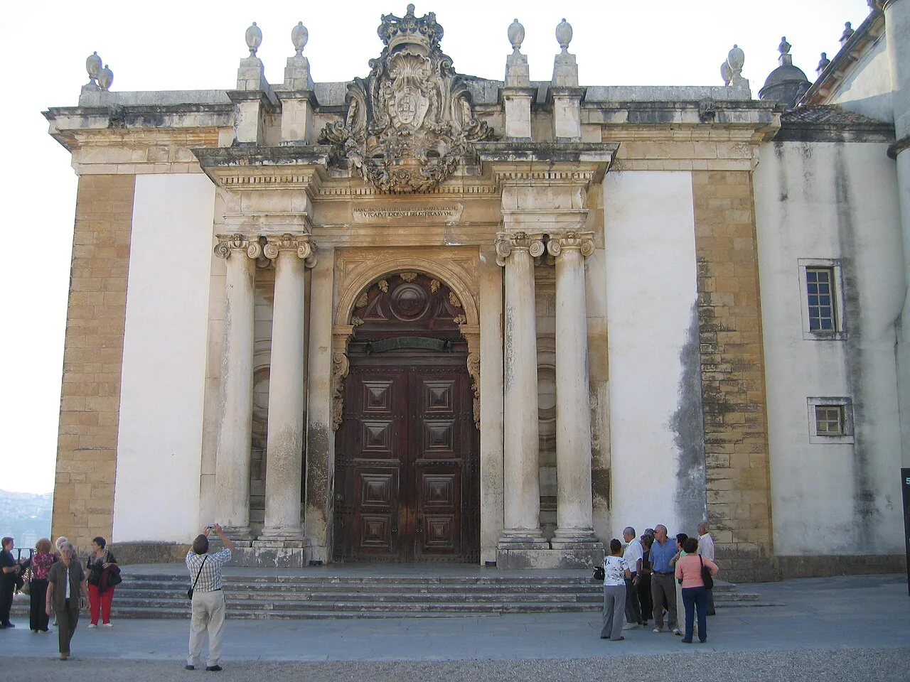 The entrance portal of the Joanina Library at the University of Coimbra.