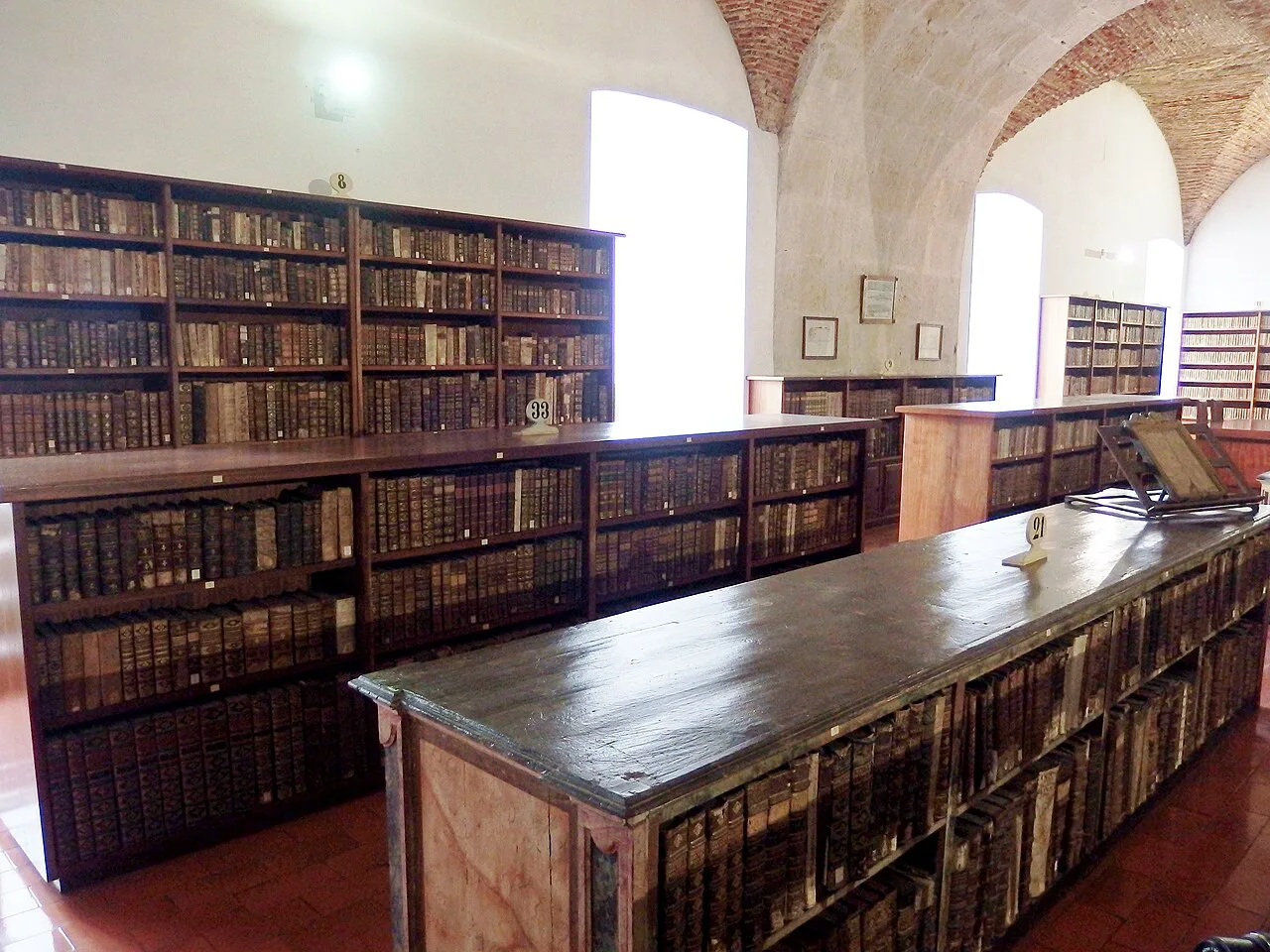 Bookcases on the middle floor of the Joanina Library at the University of Coimbra.