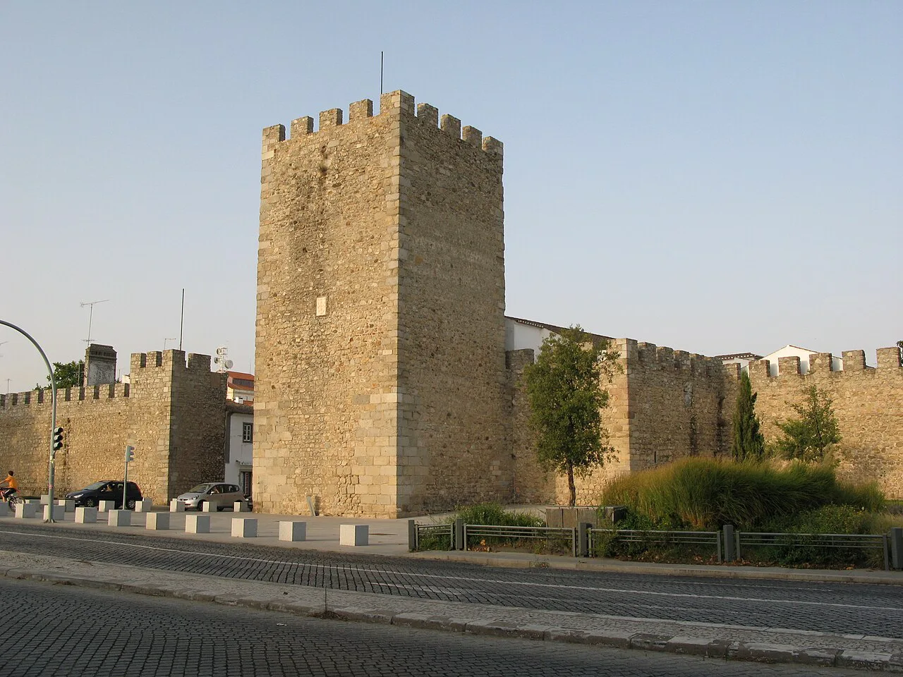 A square stone tower in Évora's city walls.
