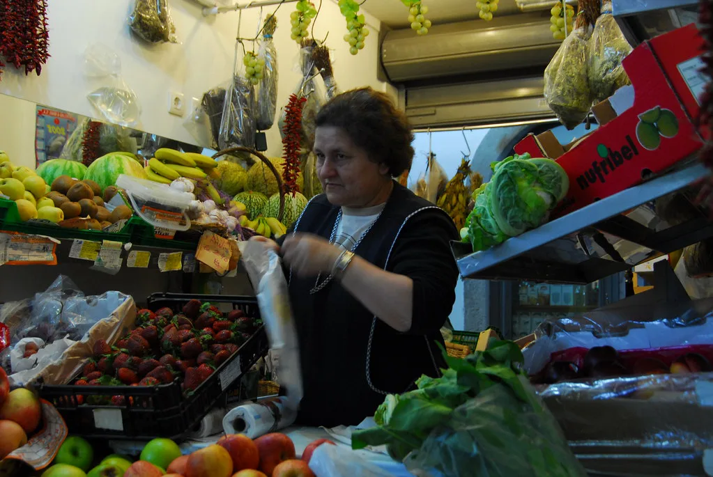 Fruit and vegetables piled on a stall at the municipal market in Évora.