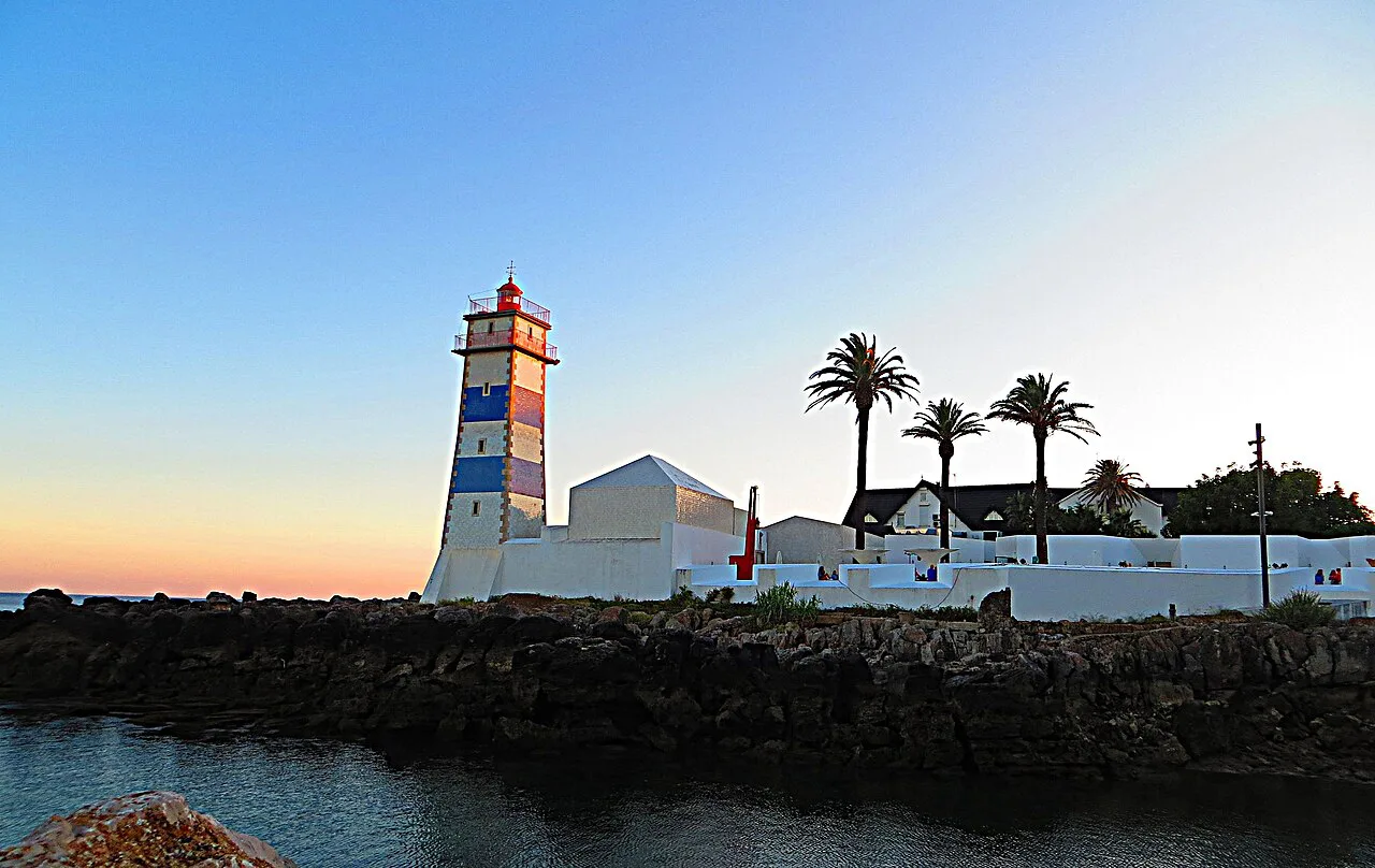 The blue-and-white striped Santa Marta lighthouse in Cascais.