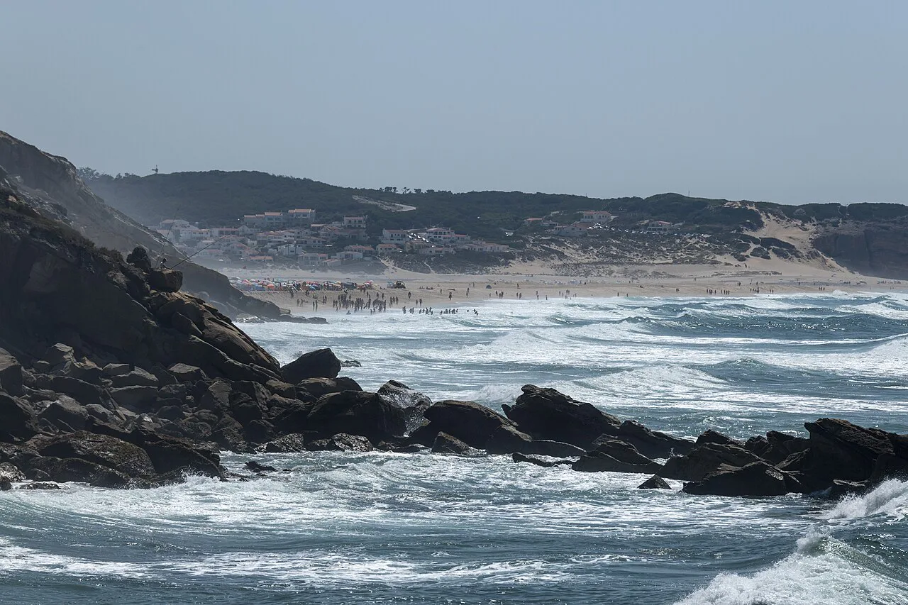 Waves breaking on the rocky coast at Foz do Arelho.