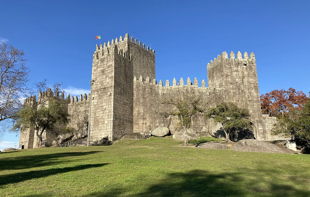 Guimarães Castle on its grassy hill.