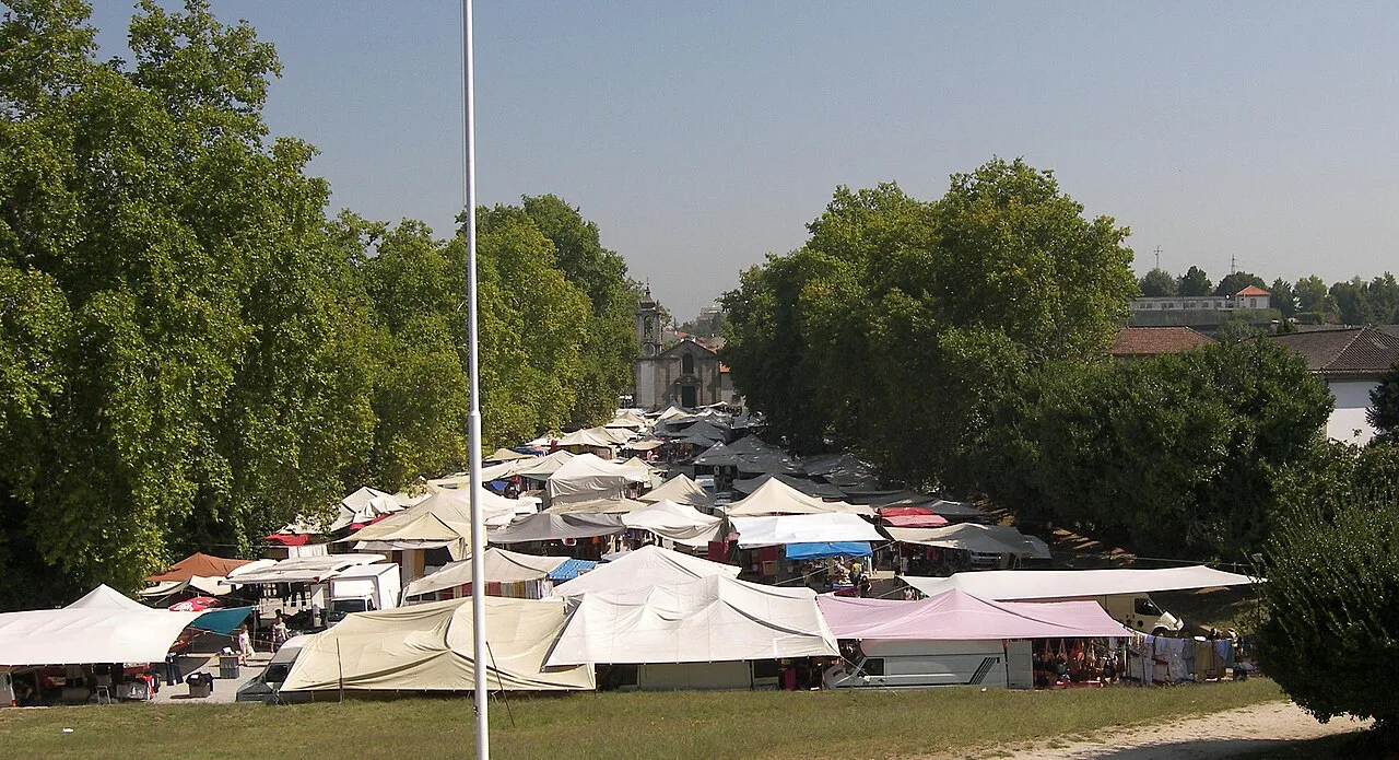 The weekly market in São Mamede Park, Guimarães, seen from the castle.
