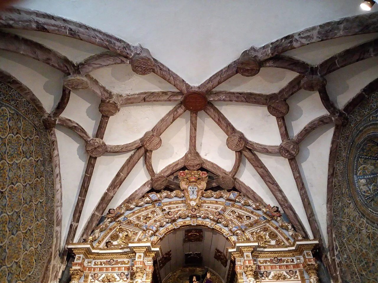 The ribbed vault above a chapel inside the Igreja de Santa Maria do Castelo in Tavira.