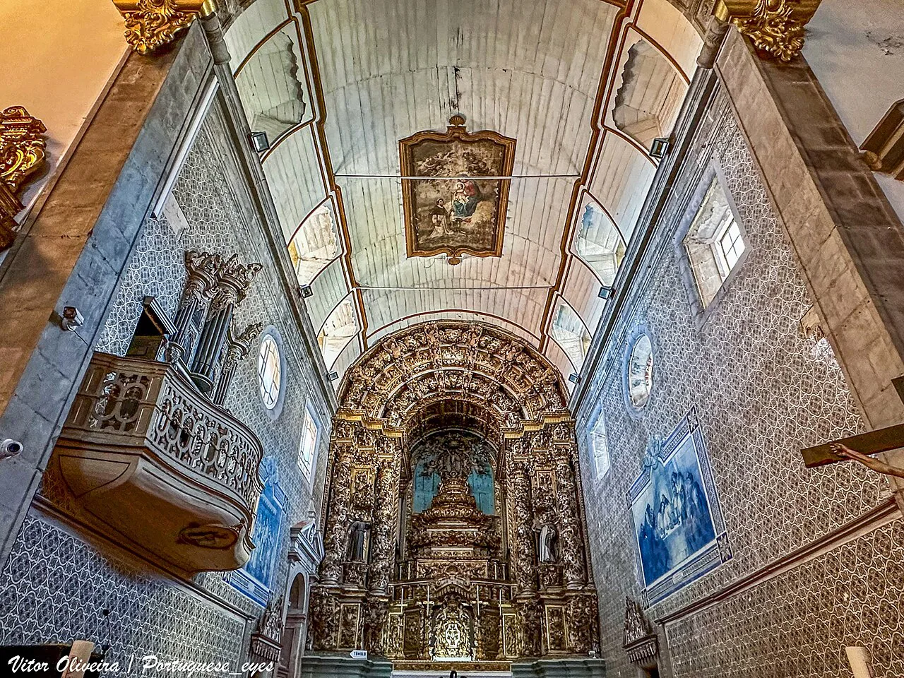 Azulejo-lined walls and gilded altarpiece inside the Igreja de São Domingos in Viana do Castelo.