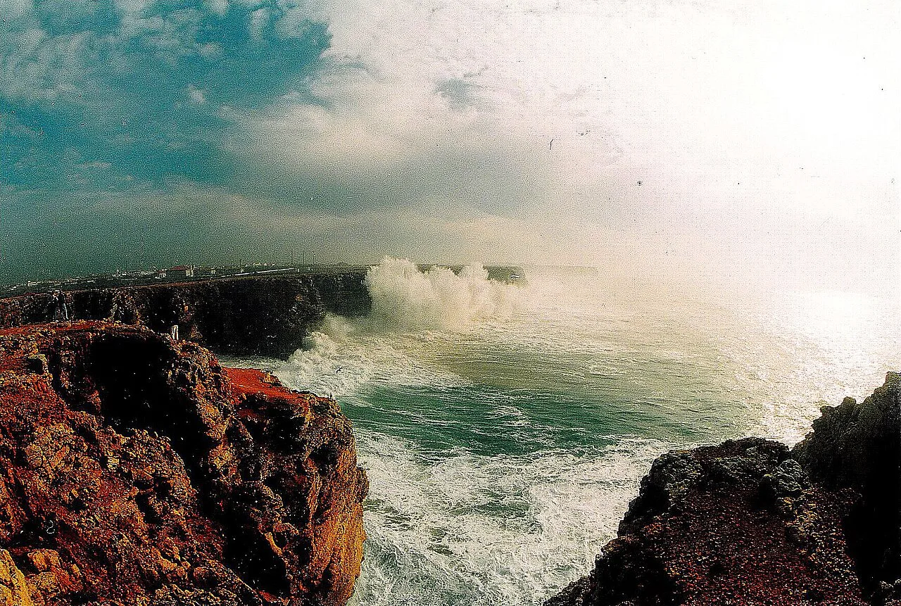 Storm waves breaking against the cliffs at Sagres in December.