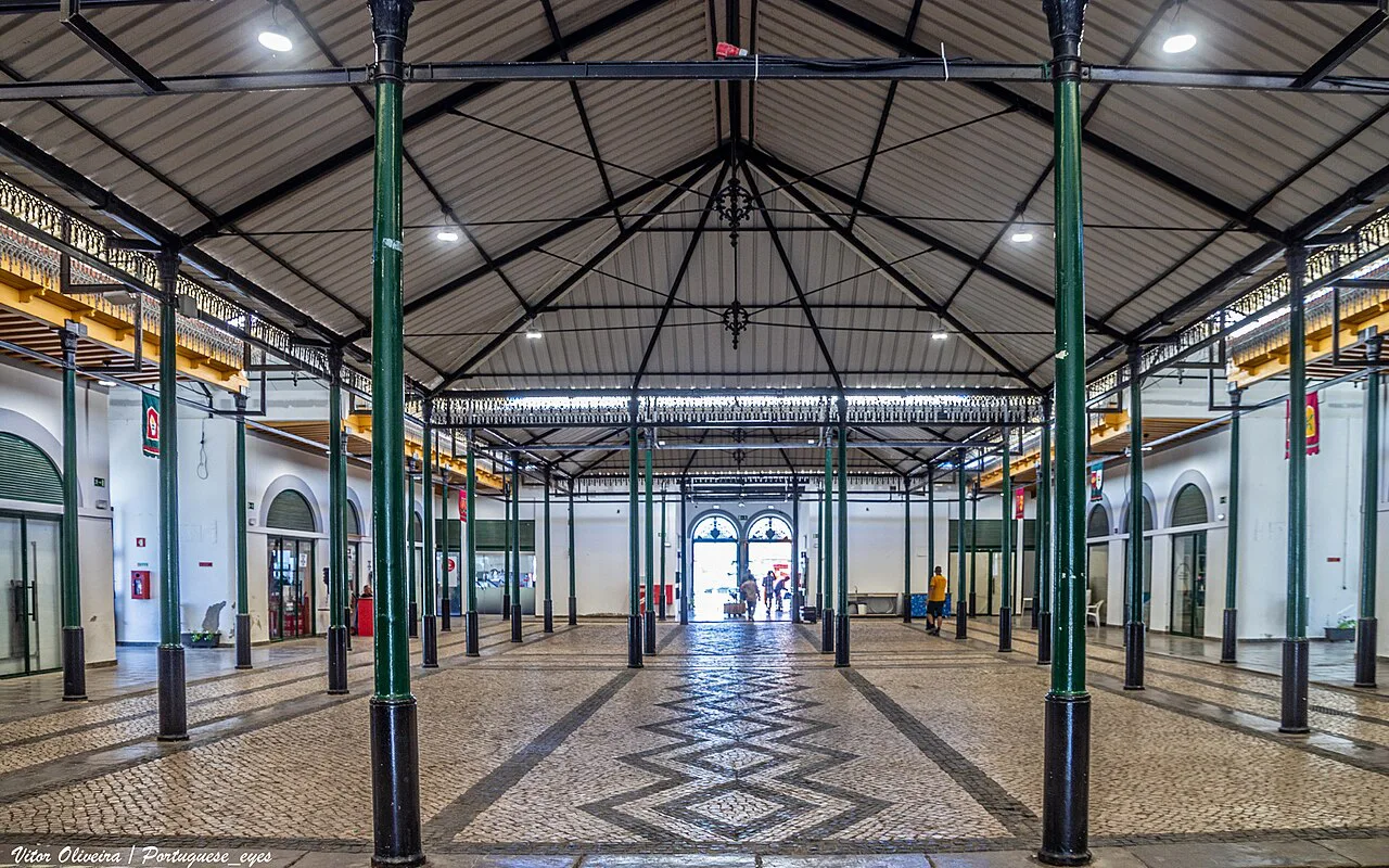 The 19th-century iron-framed Mercado da Ribeira beside the Jardim do Coreto in Tavira.