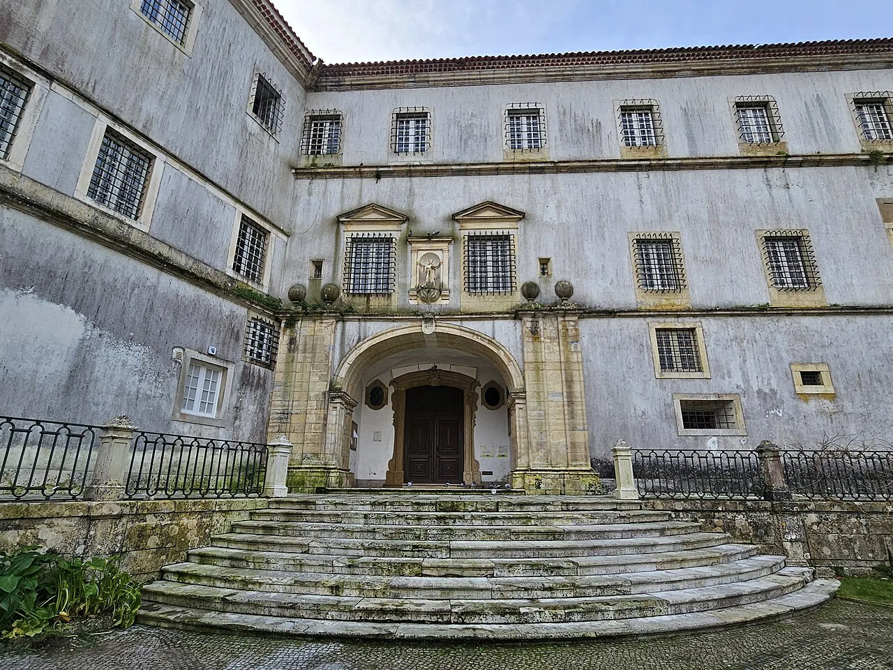 The entrance steps and facade of the Mosteiro de Lorvão in Penacova.