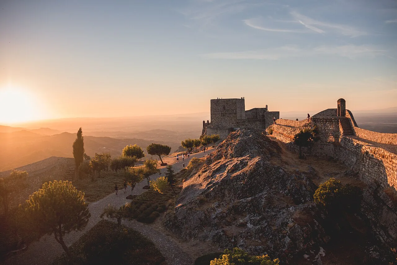 Marvão Castle on its granite ridge at sunset.