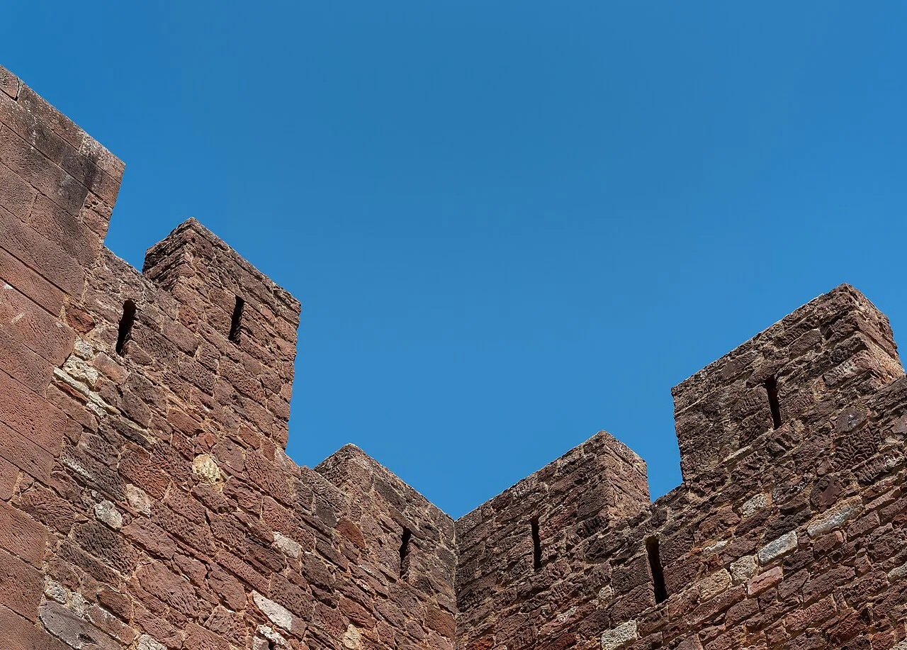 Red sandstone battlements of Silves Castle in the Algarve.