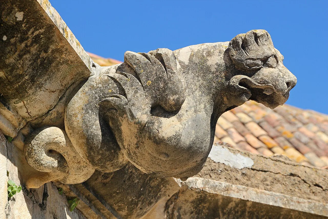 A carved stone gargoyle at the archaeological museum in Faro.