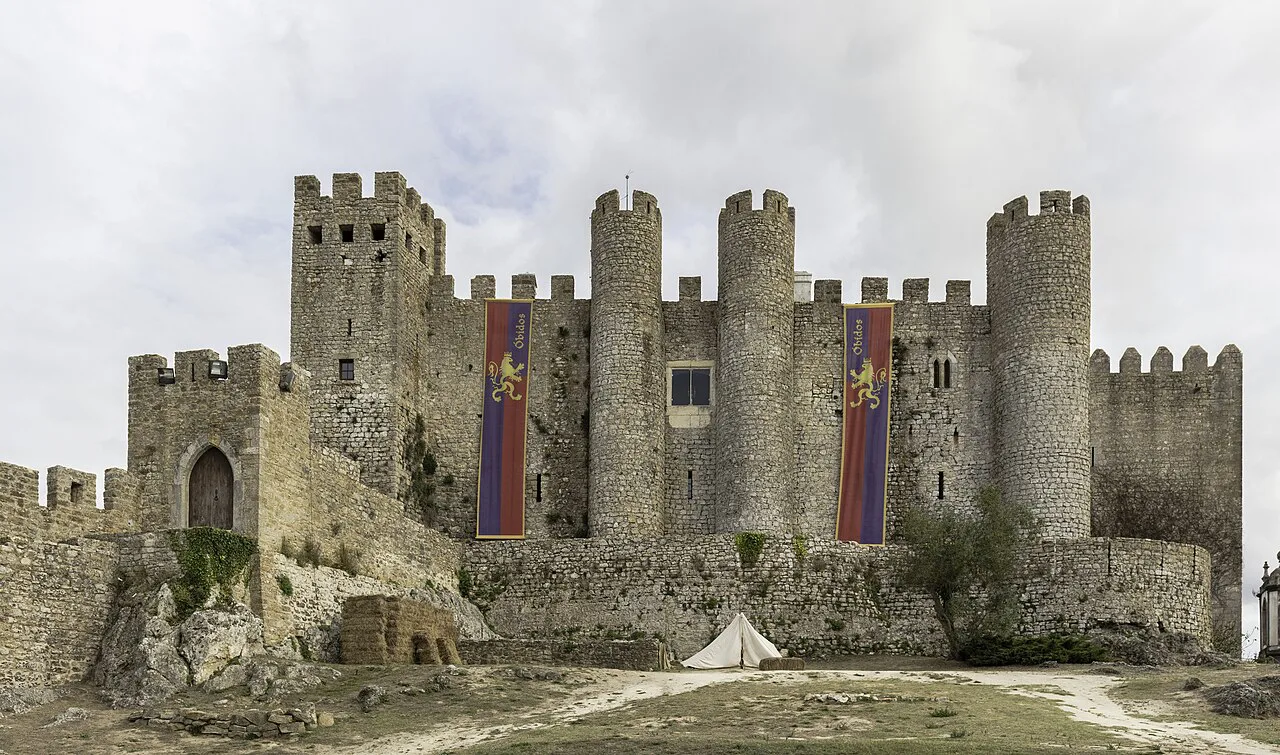 The towers and walls of Óbidos Castle.