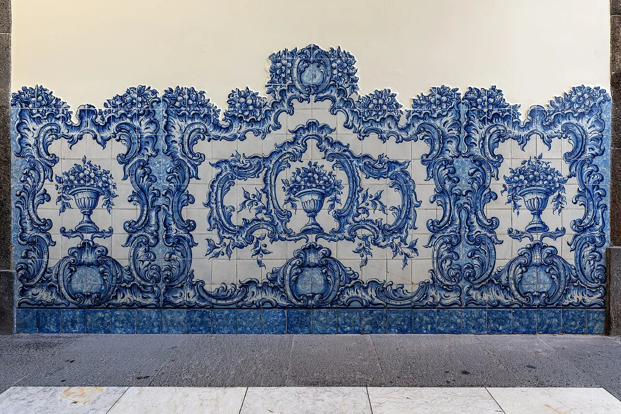 Blue-and-white azulejo panels in a hallway of Funchal's town hall.