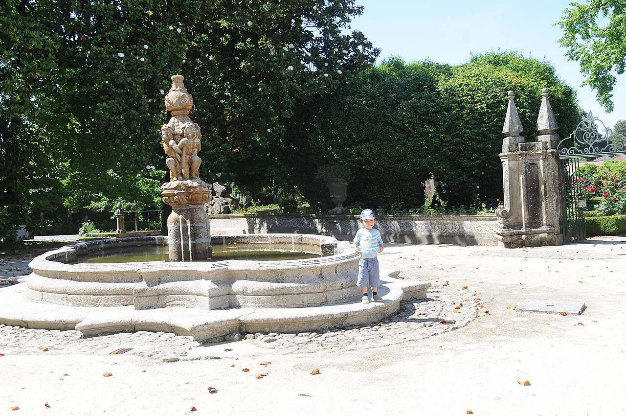 A stone fountain in the garden of the Biscainhos Palace in Braga.