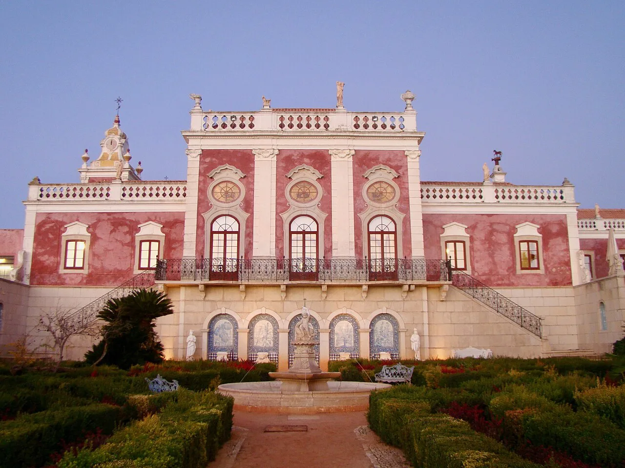The pink façade and gardens of the Palácio de Estoi near Faro.