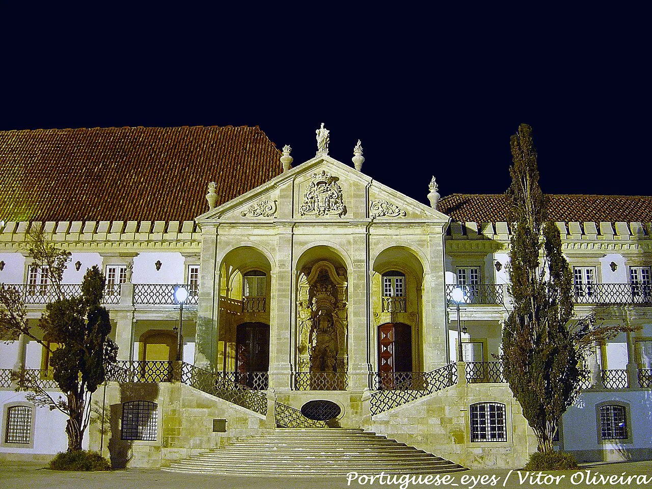 The Via Latina on the former royal palace, overlooking the Pátio das Escolas in Coimbra, at night.