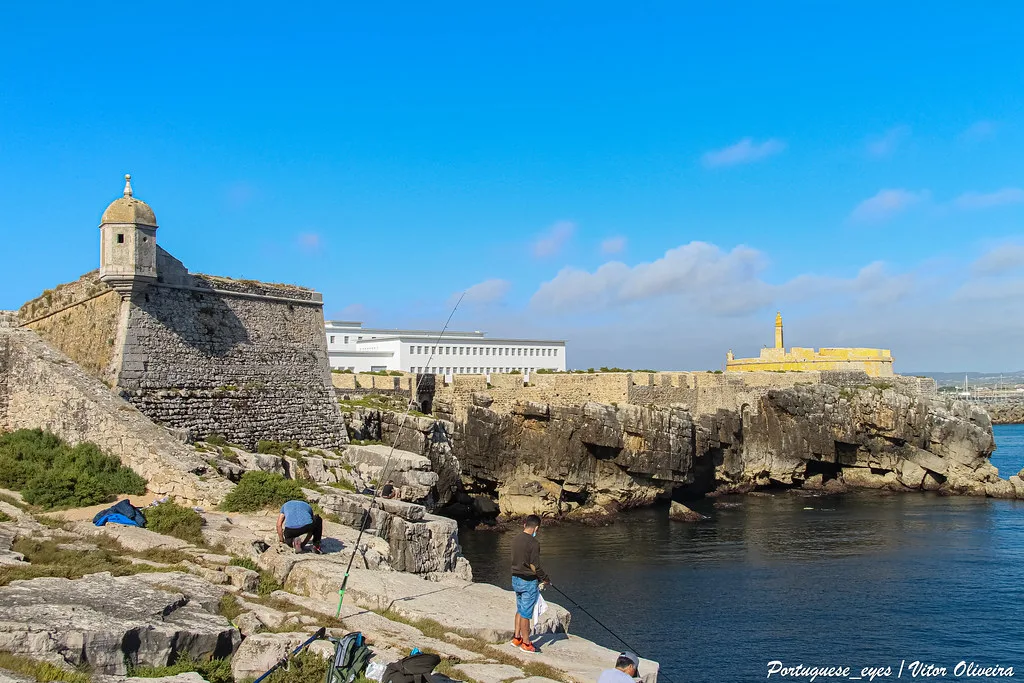 The Fortaleza de Peniche on the rocky shore by the water in Peniche.