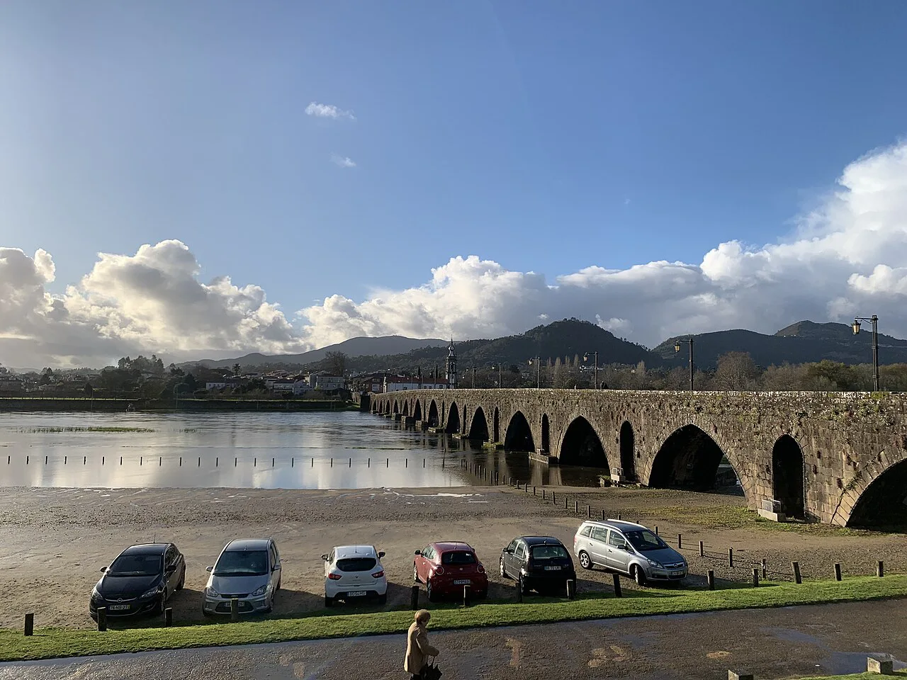The bridge at Ponte de Lima seen from the riverbank.