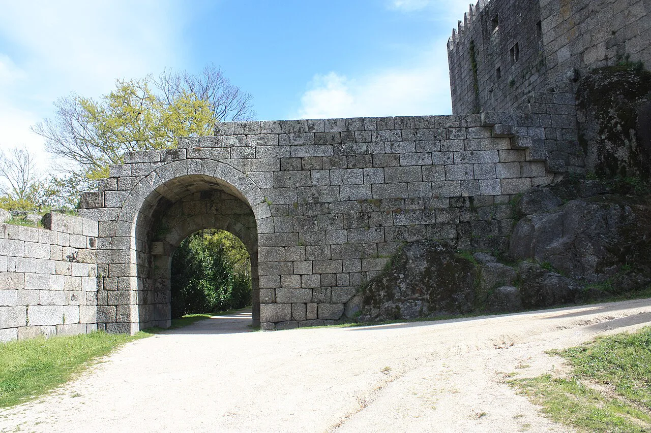 An arched gateway in the walls of Guimarães Castle.