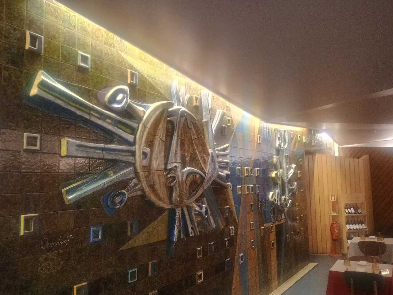 Decorative wall art inside Pastelaria Mexicana in Lisbon's Areeiro district.